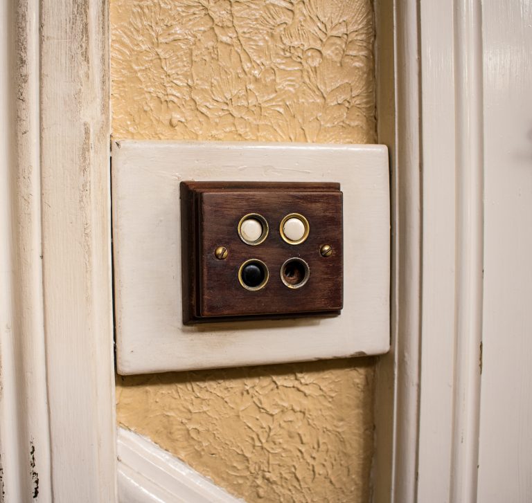 Old antique light switch buttons